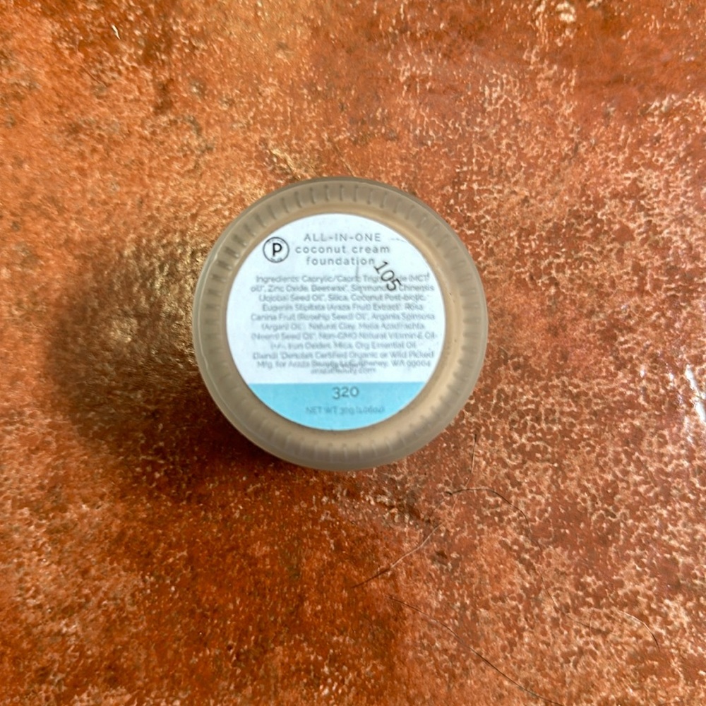 Araza all in one coconut cream foundation. Shade 320